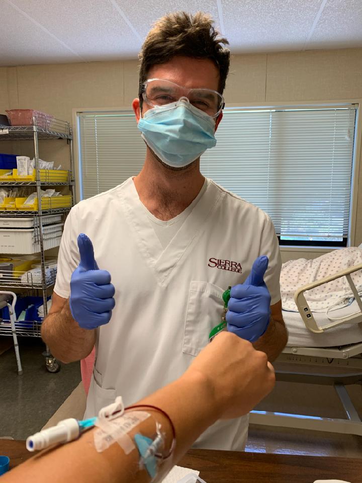 Vitaliy — registered nurse and creator of NCLEX Audio — in clinical training at Sierra College